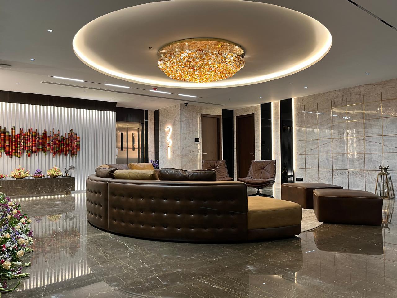 Lounge seating with round chandelier